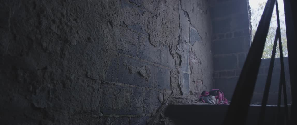 Sun shining into an abandoned stairwell