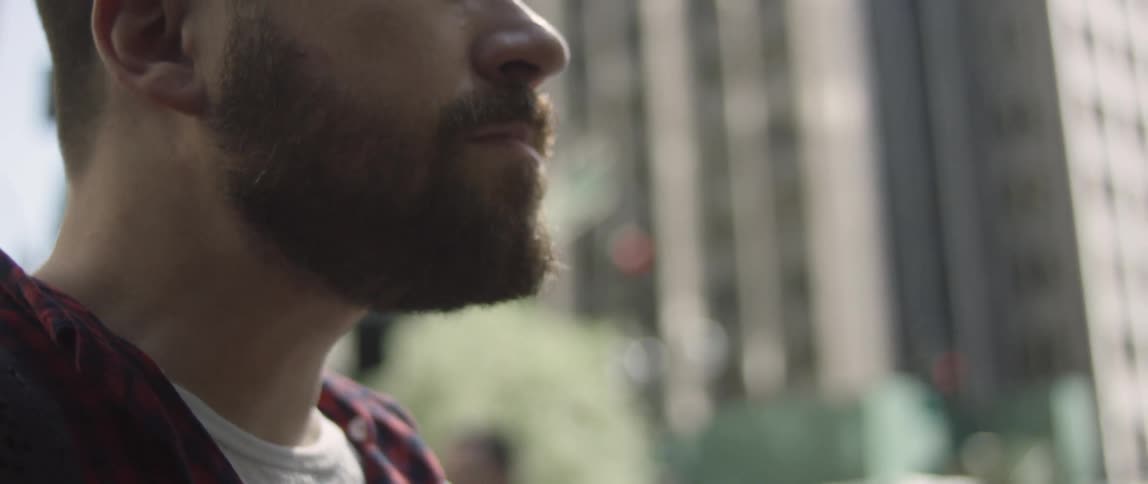 Close up of man typing on his cell phone