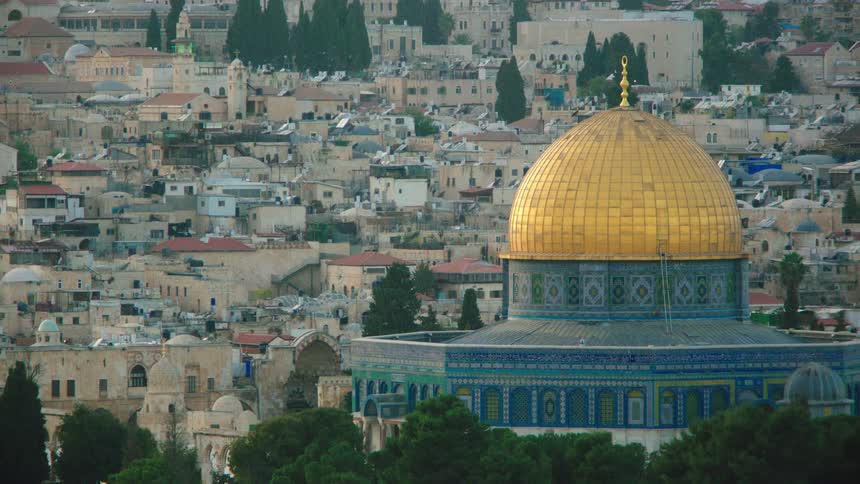 The iconic golden Dome of the Rock stands out against the historic cityscape of Jerusalem's Old City