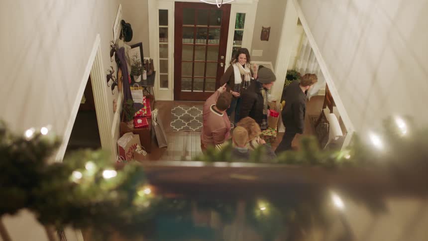 People arriving for a holiday gathering