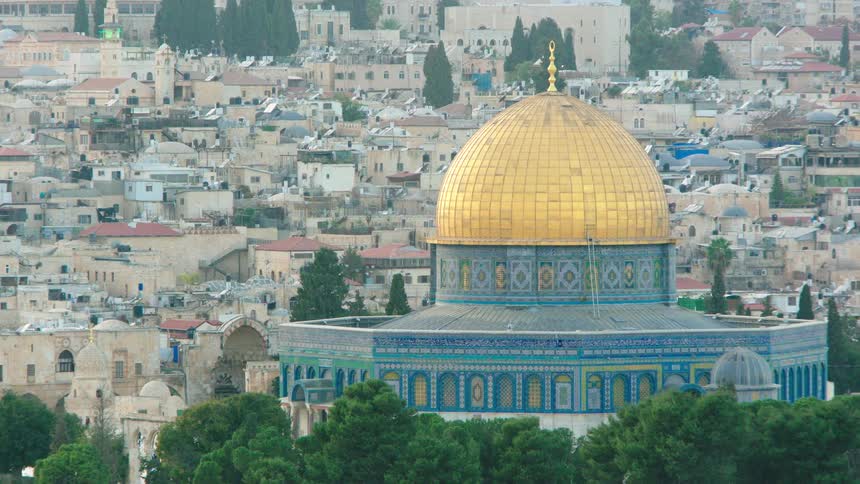 A slow zoom out reveals the iconic golden Dome of the Rock on the Temple Mount in Jerusalem