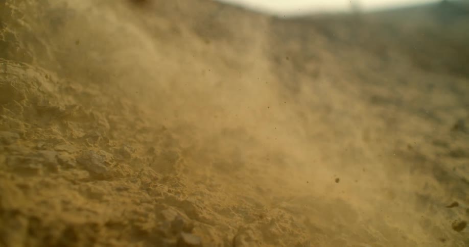The dirt on the mount falls over