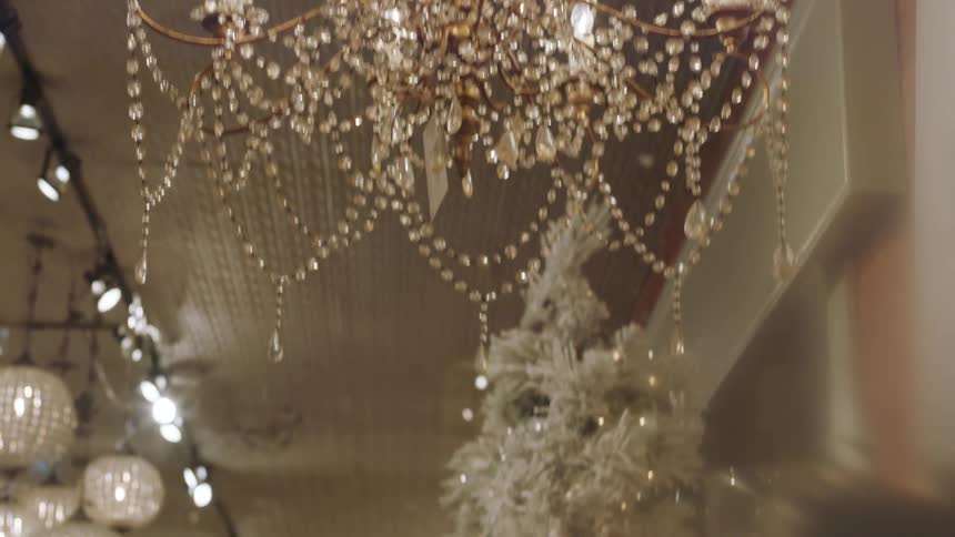 A chandelier is hanging in a shop