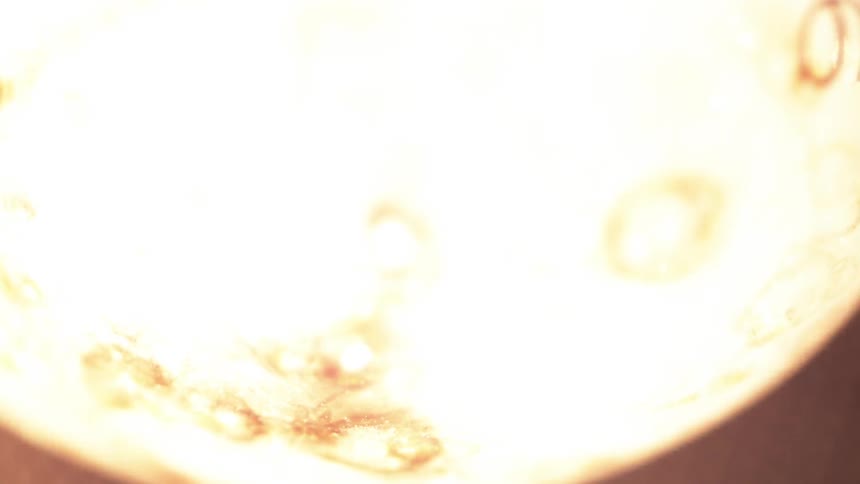 Light bulb lighting in slow motion and close up