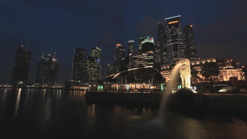 Time lapse view of an urban waterfront at night
