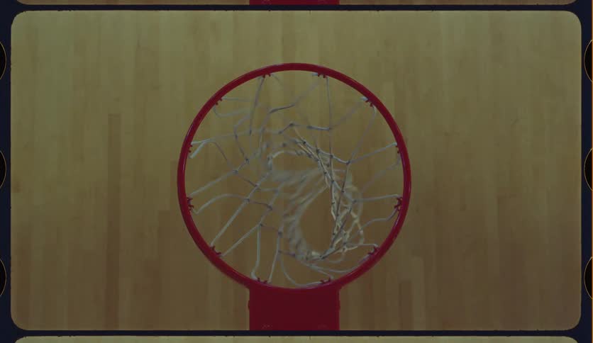 A vintage film-style overhead view captures a basketball swishing through the net, followed by a second shot that misses