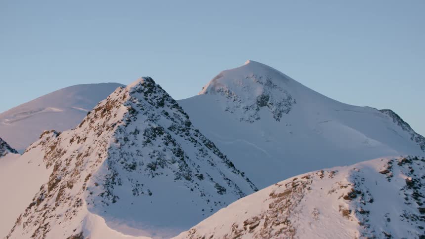 Snow covered mountains on clear day
