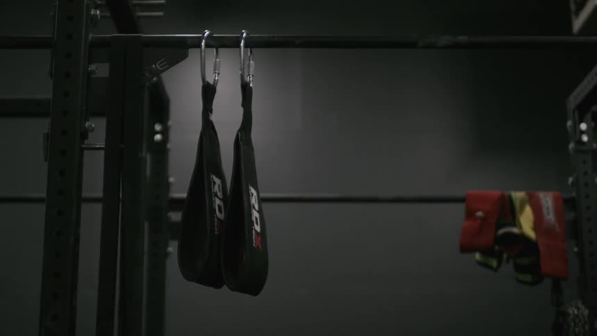 Straps hang from metal bars