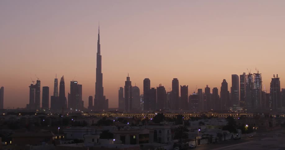 View of a large city at sunset