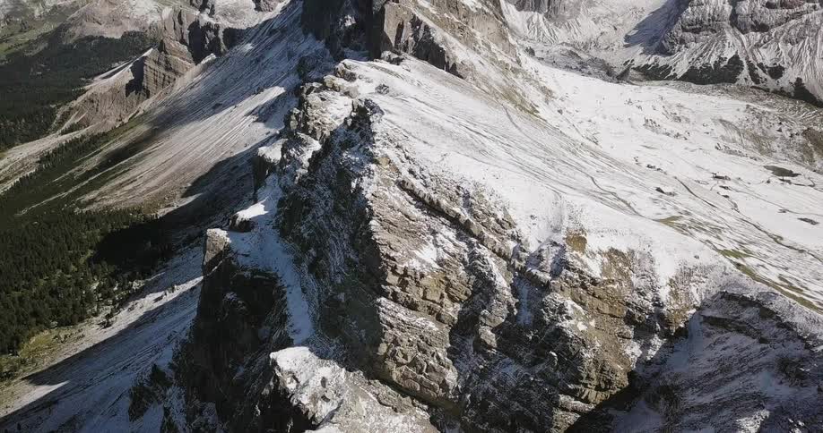 Aerial view of snow covered mountains