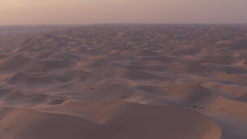 Sand dune mountains on overcast evening