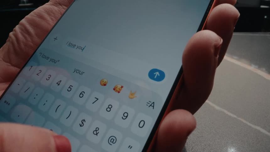 A person sends an 'I love you!' text message to a loved one, only for it to be delivered quietly as their notifications are silenced