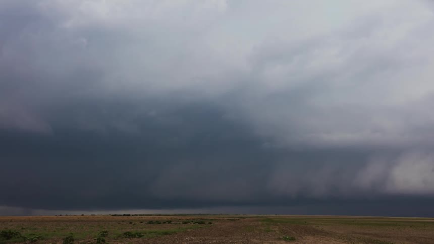 Clouds move around turning in the sky