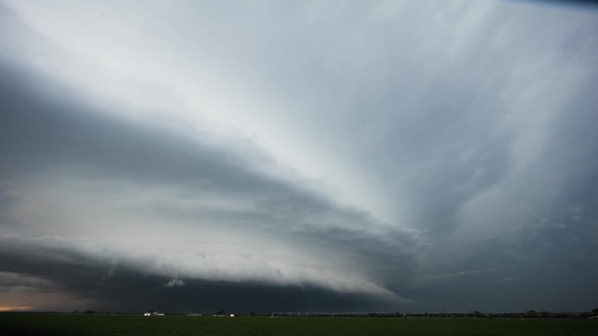 Storm clouds form and move over a rural area