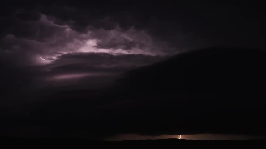 Lighting flashes in the stormy sky at night