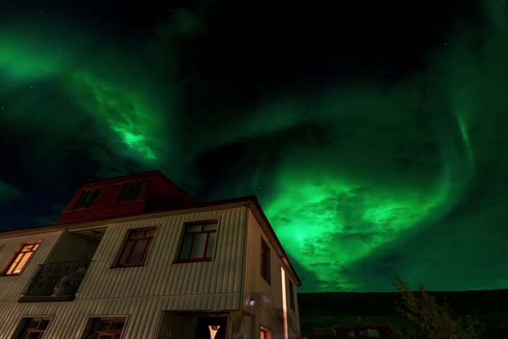 Green flares are in the night sky