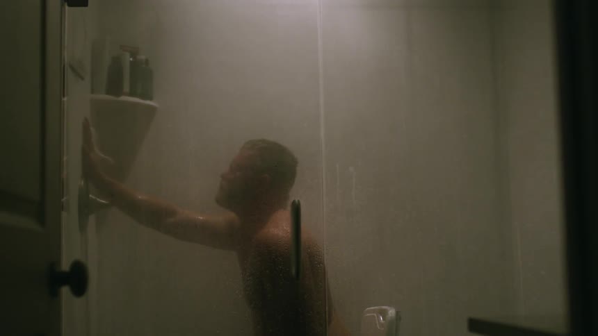 A man takes a steamy shower