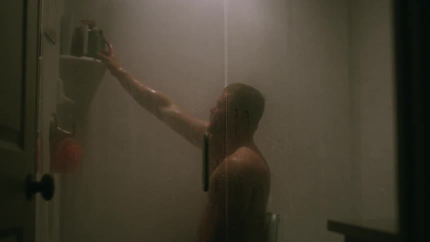 A man is taking a shower