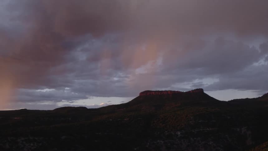 The mountain range is vast at dawn