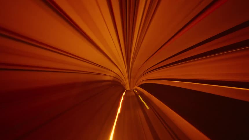 A futuristic POV time-lapse of a subway speeding through a vibrantly lit tunnel, creating a stunning visual of light trails