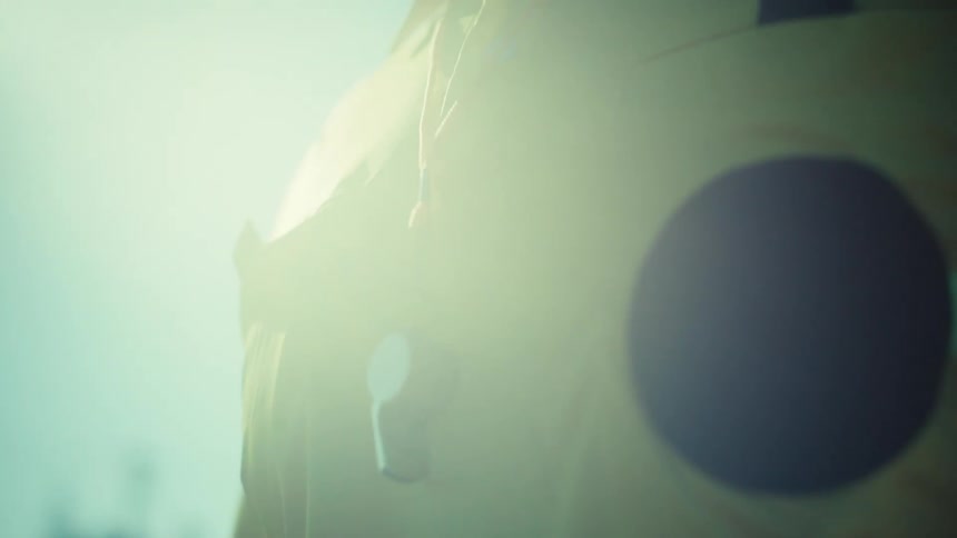 A low-angle shot transitions from a referee's whistle to his determined face, backlit by the bright sun on a clear day