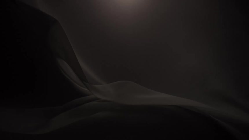 Ethereal light gracefully dances across a dark, silky, and flowing abstract background