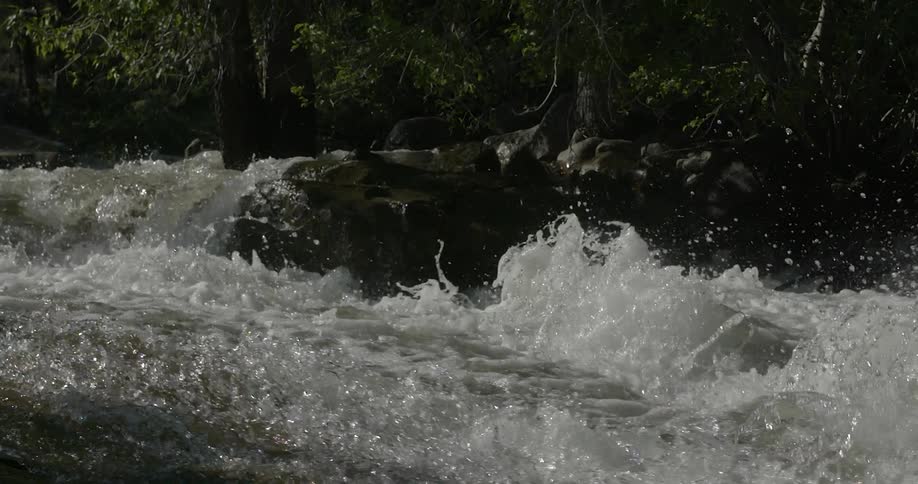 Water splashing up on a riverbed