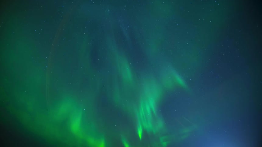The aurora borealis lights up the sky