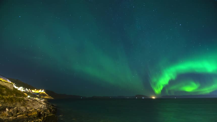 Green aurora borealis lights up the sky