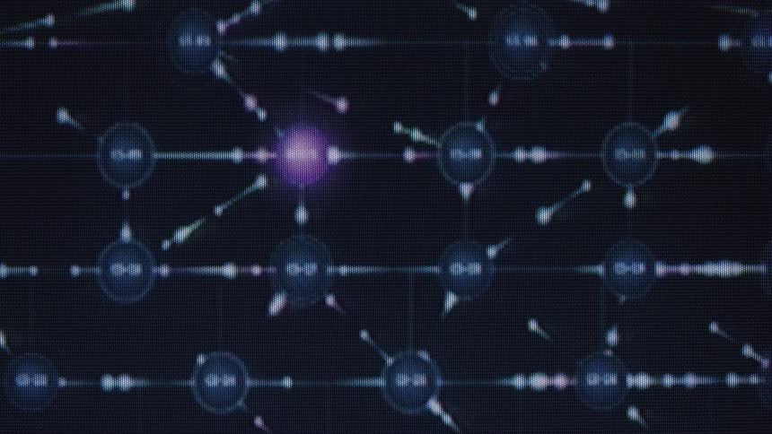 A futuristic animation of an abstract digital network shows data transferring between glowing nodes on a screen with a rack focus effect