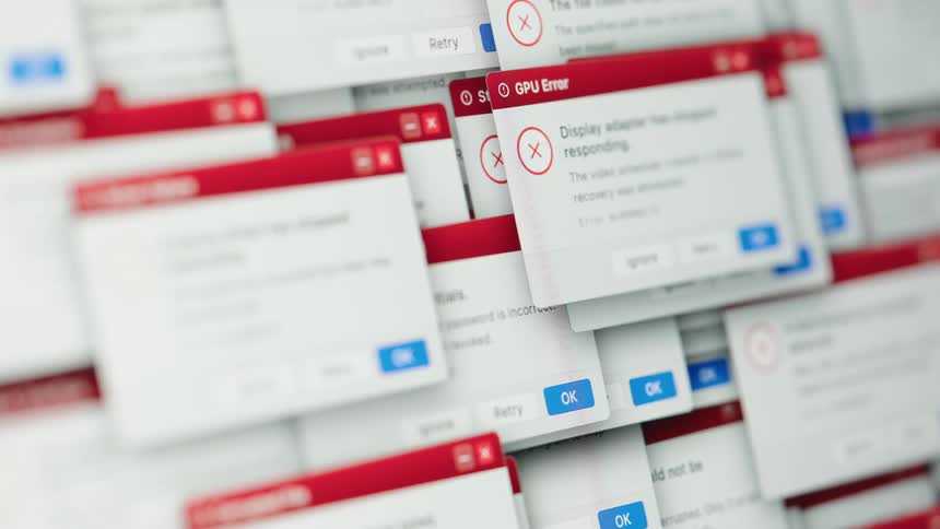 An endless stream of system error pop-ups and notifications fill a computer screen, signifying a critical malfunction