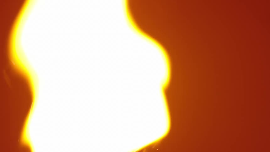An extreme close-up shot shows a fuse being ignited in slow motion, with the flame burning brightly and emitting sparks before disappearing into the dark