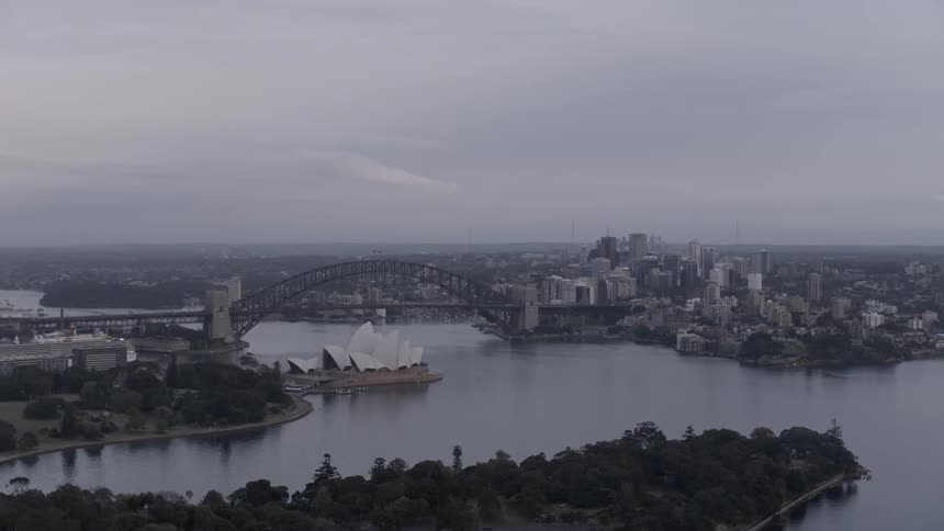 Gray clouds hang over sydney harbor