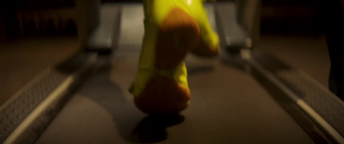 A person runs on a treadmill