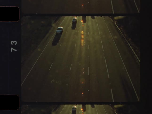 A cinematic montage on vintage film shows a woman overlooking a city and cars driving on a sunlit highway