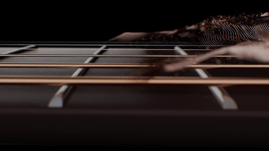 A conceptual animation shows abstract sound waves as particle streams flowing from vibrating guitar strings on a fretboard