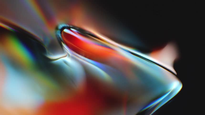 A mesmerizing macro shot of liquid-like, iridescent, and colorful shapes slowly warping and morphing