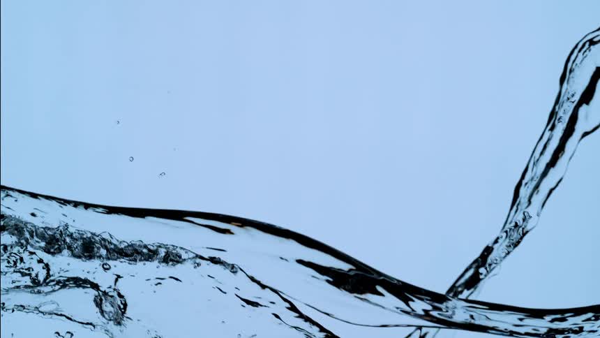 Elegant streams of pure water intertwine and flow across a light blue background in stunning slow motion
