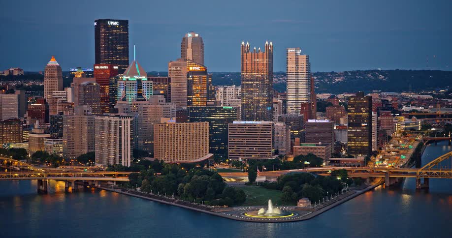 A beautiful time-lapse of the Pittsburgh, Pennsylvania skyline and Point State Park as the city lights turn on at dusk