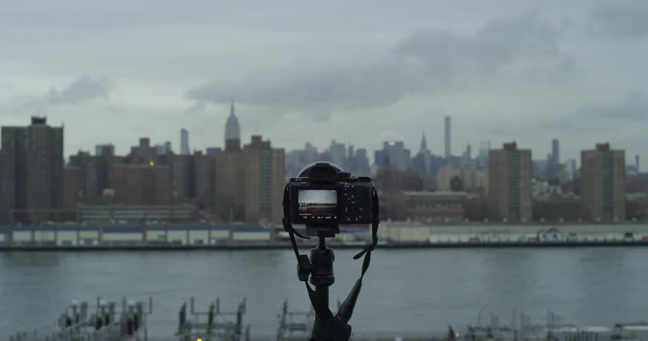A camera is set to take photographs of a city