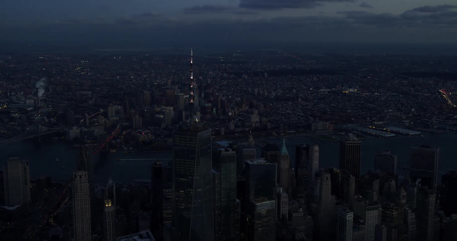Large city seen from high on a very cloudy evening