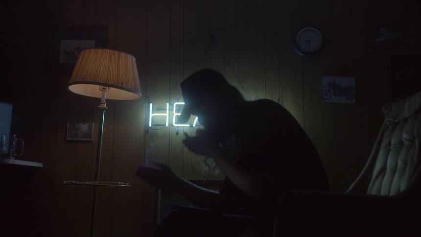 A man lights a cigarette