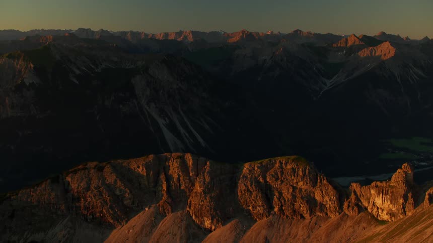 Mountainous landscape at sunset