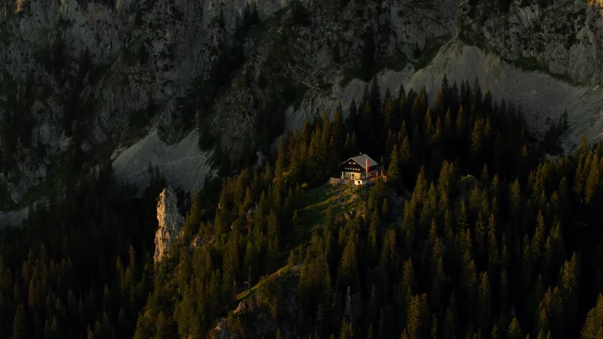 A house on a wooded mountain side