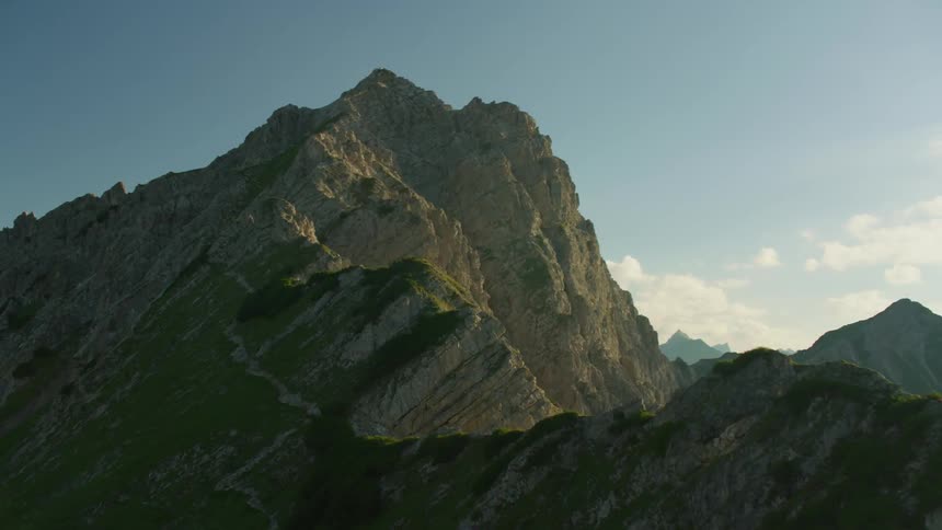 Viewing the sharp, rocky mountain peaks from above