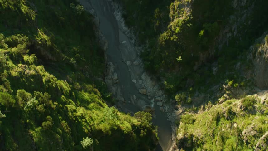 A river runs through a canyon