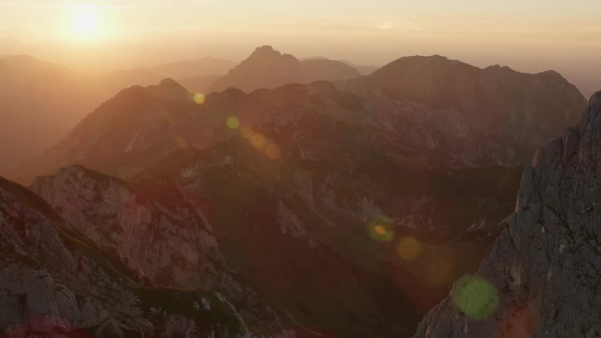 Mountainous landscape at sunset