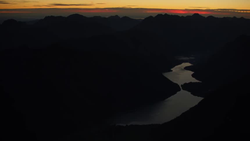 A small canal sets below at dawn