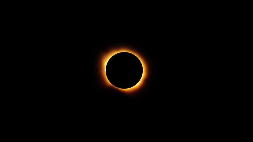 A stunning time-lapse of a total solar eclipse, from partial crescent to the glowing corona of totality and back again