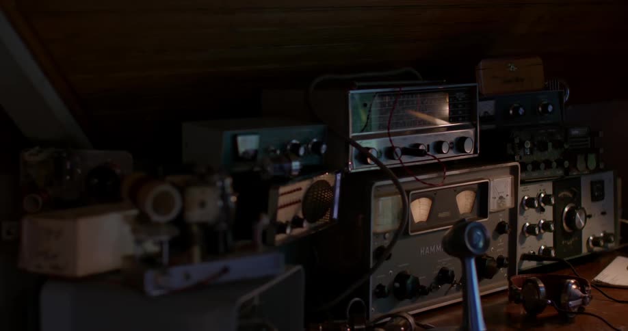 Radios and sound equipment in a dim room